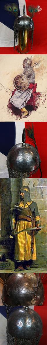 An Indian Kulah Khud Helmet With Fully Etched and Engraved With Exotic Birds and Figures. Mounted With the Traditional Spike & Peacock Feather Plume Mounts