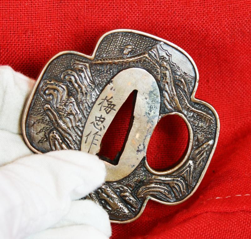 A Superb Edo Period Umetada Tsuba Signed Yamashiro kuni ju Umetada Shigenari, From the Umetada Line Of Tsuba Makers of Yamashiro. Of A Carved Takebori Kitsune {Fox} Going To The Kitsune no Yomeiri {The Foxe's Wedding}