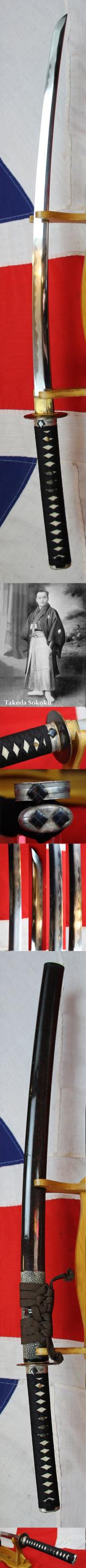 A Beautiful Signed Showa 1930's Blade, Likely Gendaito, With a Stunning Notare Midare Hamon. Traditionally Samurai Mounted Katana in Fine Polish, By Seki Yoshimitsu. Edo Period Shakudo Tsuba And Samegawa Decor Saya With Black & Red Flecked Lacquer