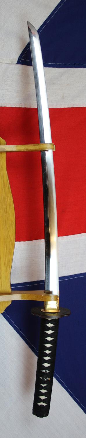 A Simply Stunning A Fabulous Original Antique Shinto Early Edo Period Chisa Katana. Wondrous Pure Gold and Shakudo Mounts Of The Tale of Momotarō, the Demon and The Monkey. Superbly Beautiful Blade Hamon and Hada Grain