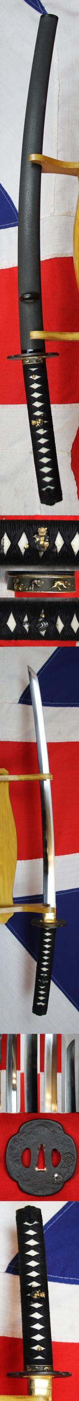 A Simply Stunning A Fabulous Original Antique Shinto Early Edo Period Chisa Katana. Wondrous Pure Gold and Shakudo Mounts Of The Tale of Momotarō, the Demon and The Monkey. Superbly Beautiful Blade Hamon and Hada Grain