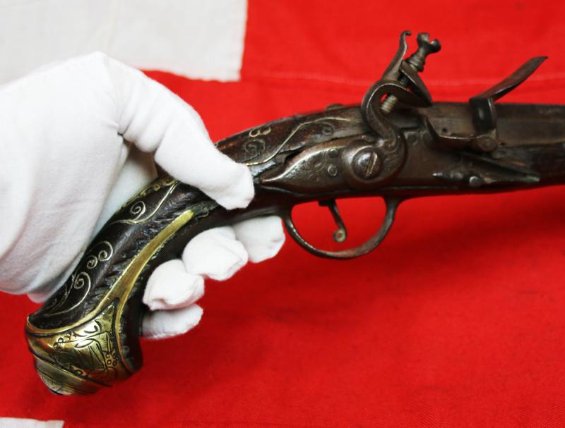 A Superb Corsair Pirate Captain’s Pistol. An I8th Century Long Flintlock, Italianate Style. Very Fine Quality Mounts and Engraving From The Mediterranean Region, as Used Throughout the Seven Seas From the Golden Age of Piracy.