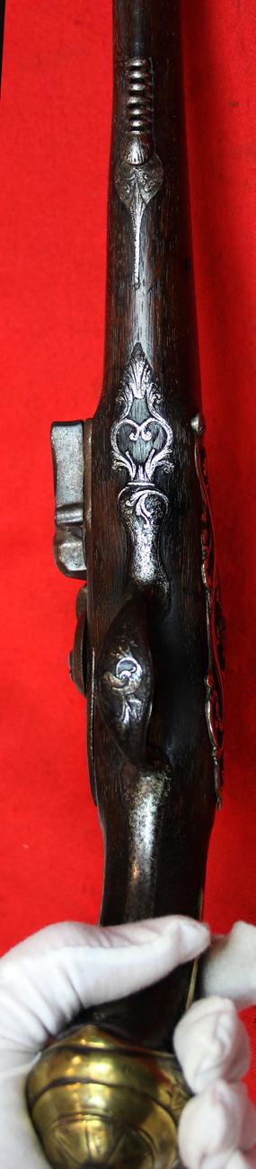 A Superb Corsair Pirate Captain’s Pistol. An I8th Century Long Flintlock, Italianate Style. Very Fine Quality Mounts and Engraving From The Mediterranean Region, as Used Throughout the Seven Seas From the Golden Age of Piracy.