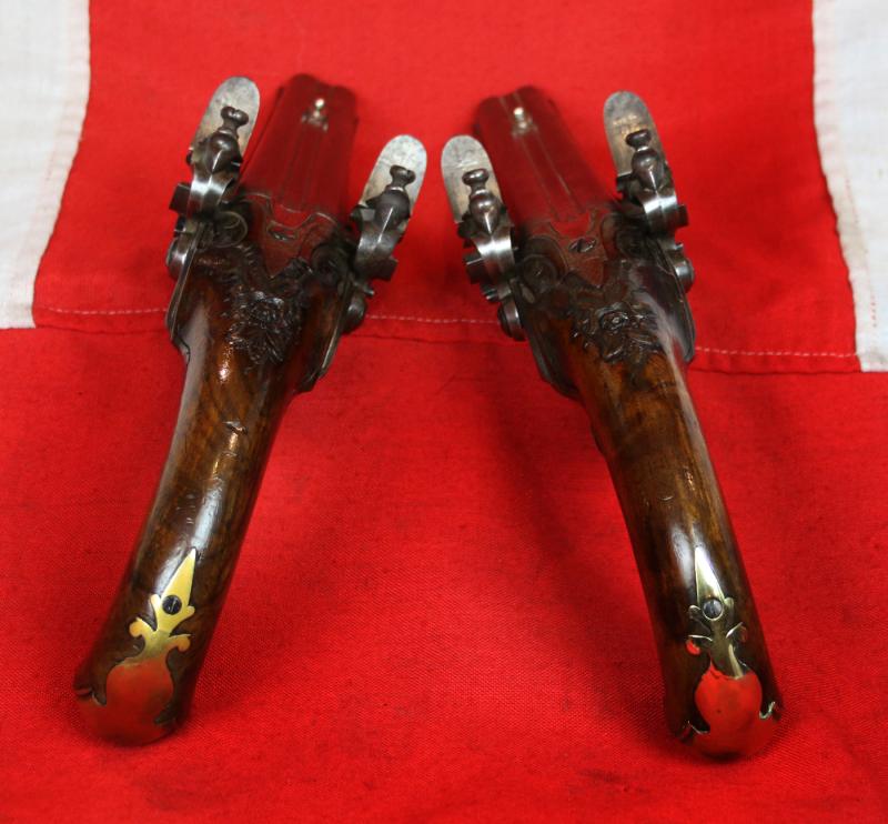 A Pair Of Finest Irish Silver Mounted Holster Pistols By John Govers Of Dame St. Dublin 1760. Finest Silver Cartouches Each One Engraved With The Original Owner, An Irish Duke's, Noble Crests, Of Irish Ducal Crowned Lions Passant, Set In Noble Shields
