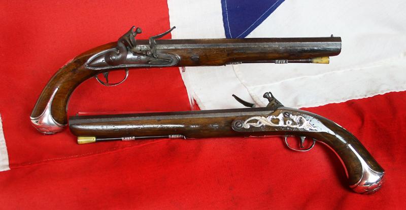 A Magnificent Pair of 18th Century London, Silver Mounted Long Holster Pistols Circa 1720, By George Halfhide of The Minories London. Elected Master of the London Gunmakers Company in 1736