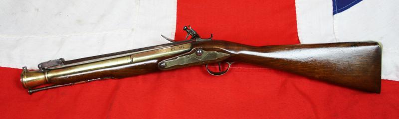 A Superb Royal Naval, Brass Cannon Barrel Blunderbuss With Finest 'Juglans Regia' Walnut Stock Spring Bayonet, Elaborately Engraved All Brass Furniture, by Daykin of Nottingham