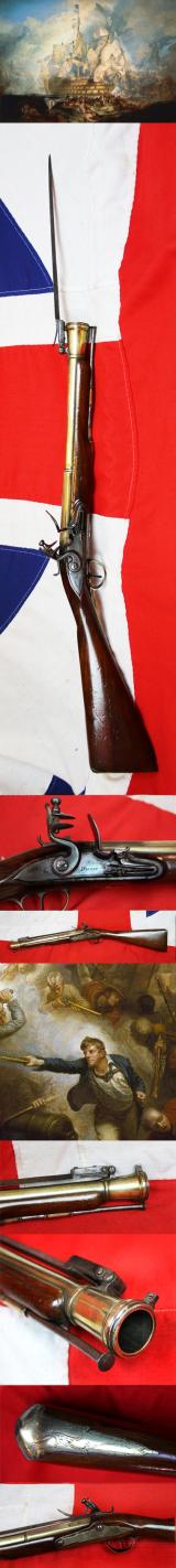 A Superb Royal Naval, Brass Cannon Barrel Blunderbuss With Finest 'Juglans Regia' Walnut Stock Spring Bayonet, Elaborately Engraved All Brass Furniture, by Daykin of Nottingham