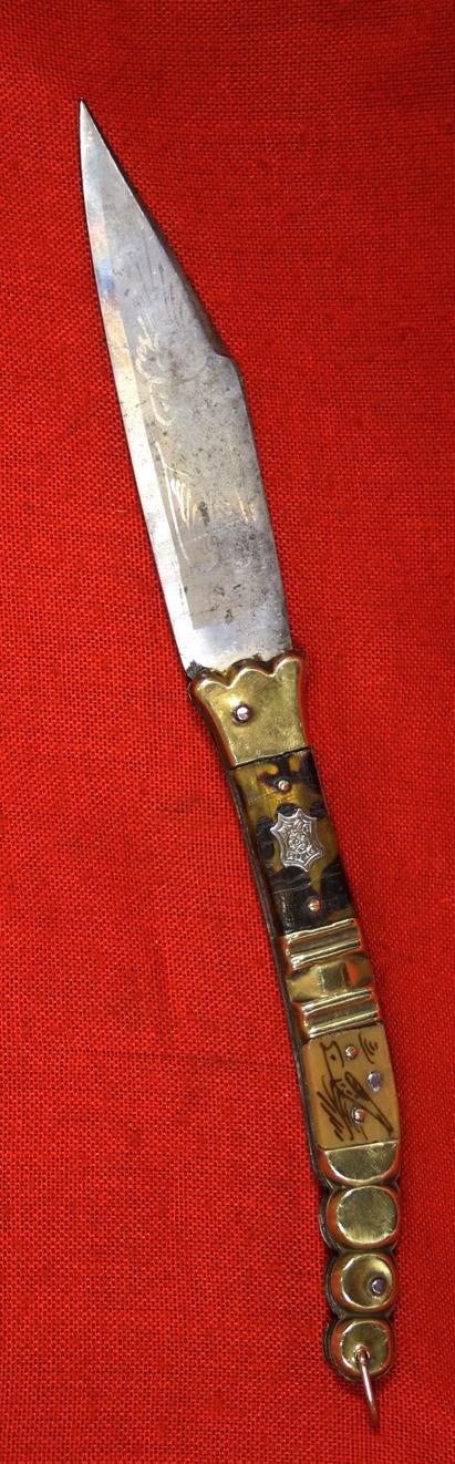 A Superb Antique Navaja Folding Knife 19th Century Circa 1850 Deluxe Etched Blade With Wings Tortoishell Panel Handle with Rattlesnake Tail Pattern. An Absolute Beauty!