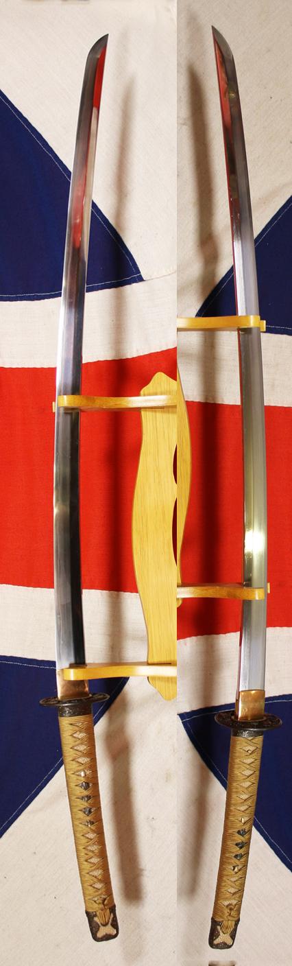 Early Shinto, Signed, Yamashiro Daijo Fujiwara Kunitsugu (山城大掾藤原国次) Handachi Sword With Full Suite Of Omori Teruhide School 'Omori Wave' Pattern of Handachi Koshirae Of Churning Water With Inlaid Gold Sea Spray Droplets. Kinai School Budou-sukashi Tsuba
